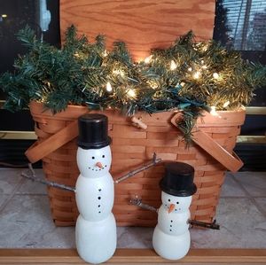 Artisan crafted wood snowmen